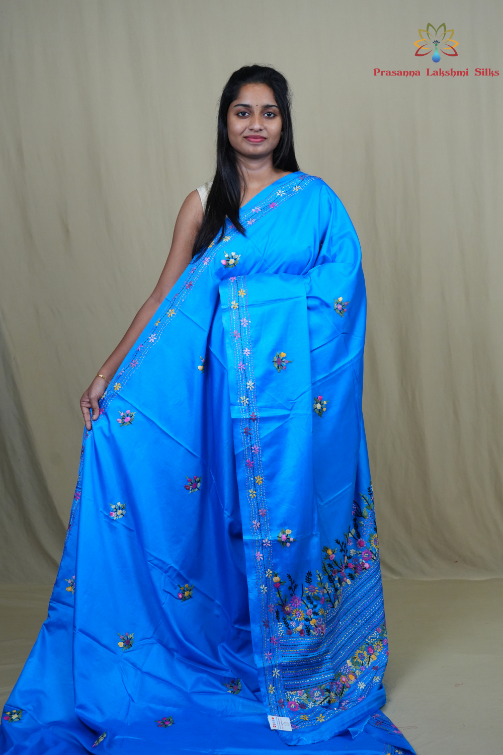 Semi Tussar saree with all-over thread woven motifs and rich Parsi work pallu.
