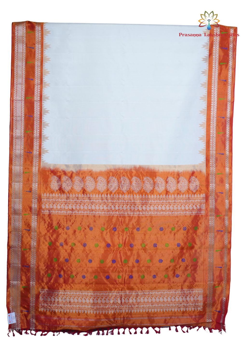 Traditional handloom Gadwal pure silk saree with zari woven tissue borders suitable for weddings.