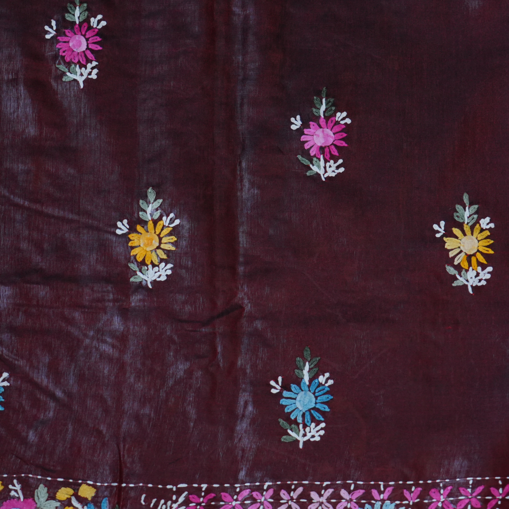 Elegant Tussar saree featuring thread woven Parsi work borders and running blouse piece.
