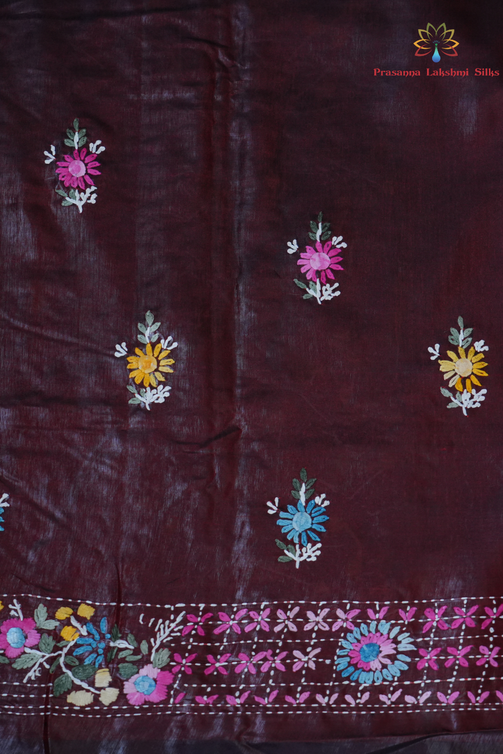 Elegant Tussar saree featuring thread woven Parsi work borders and running blouse piece.
