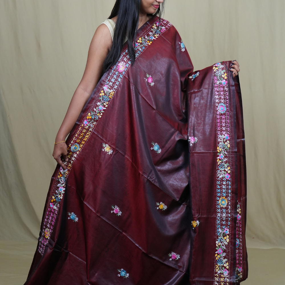 Traditional semi Tussar saree suitable for festive occasions with intricate Parsi work detailing.