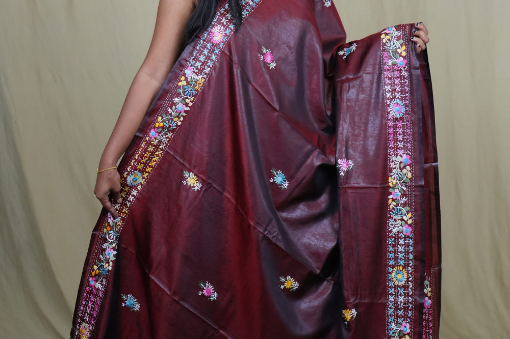 Traditional semi Tussar saree suitable for festive occasions with intricate Parsi work detailing.