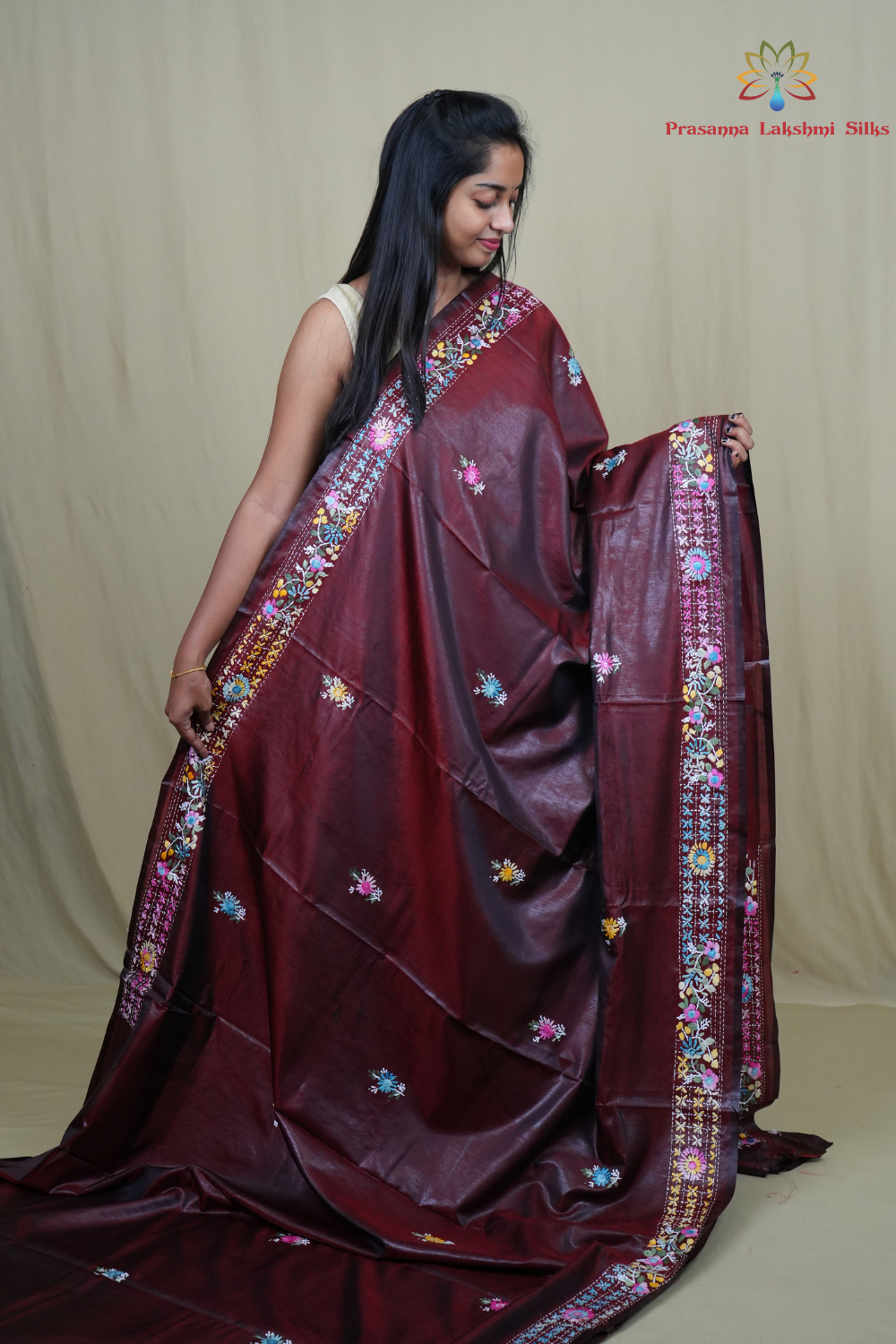 Traditional semi Tussar saree suitable for festive occasions with intricate Parsi work detailing.