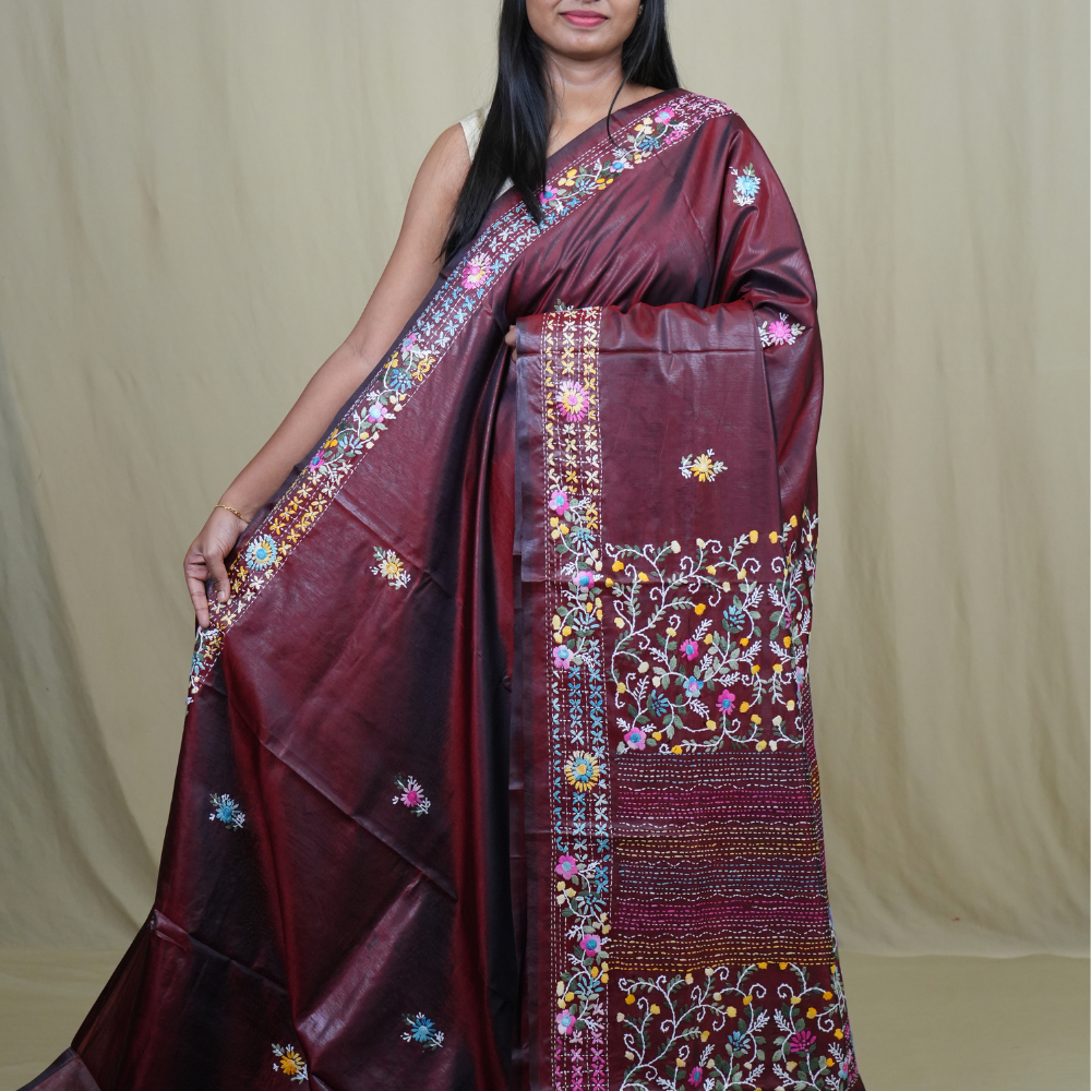 Semi Tussar saree with all-over thread woven motifs and rich Parsi work pallu.
