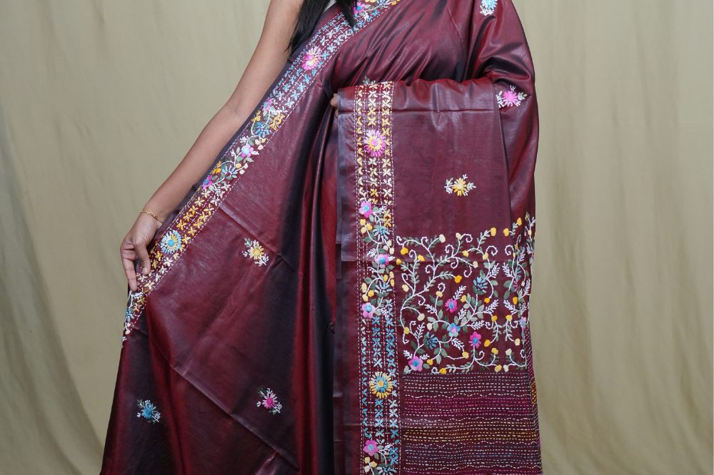 Semi Tussar saree with all-over thread woven motifs and rich Parsi work pallu.
