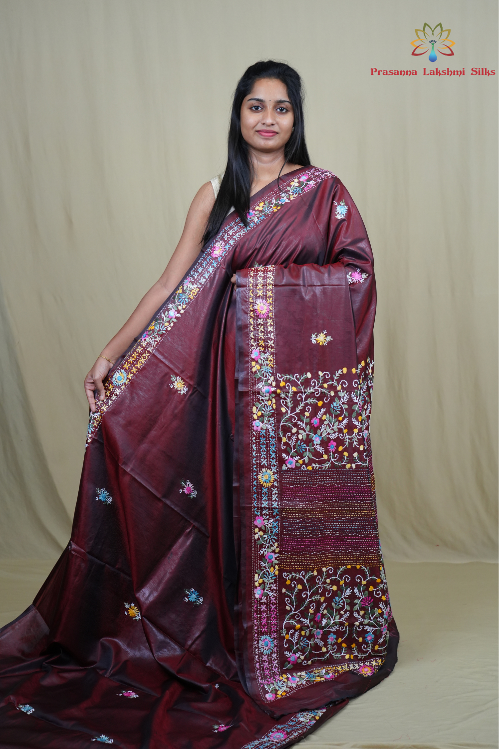 Semi Tussar saree with all-over thread woven motifs and rich Parsi work pallu.
