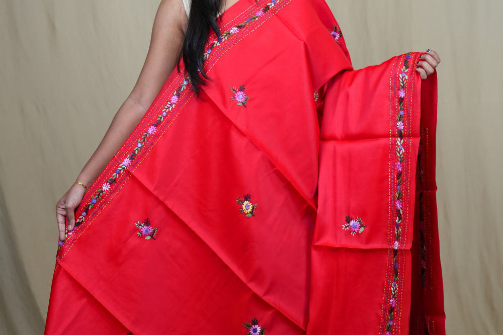 Traditional semi Tussar saree suitable for festive occasions with intricate Parsi work detailing.