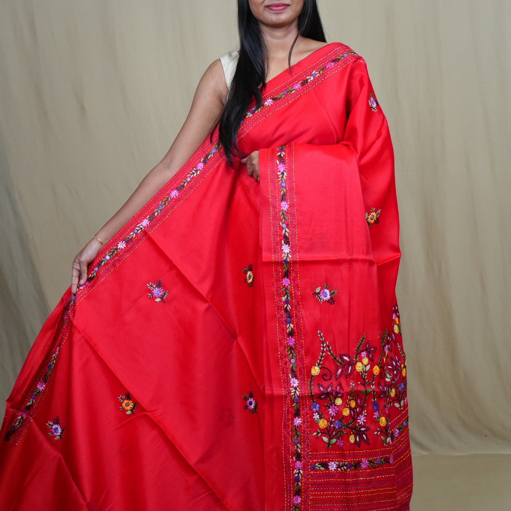 Semi Tussar saree with all-over thread woven motifs and rich Parsi work pallu.
