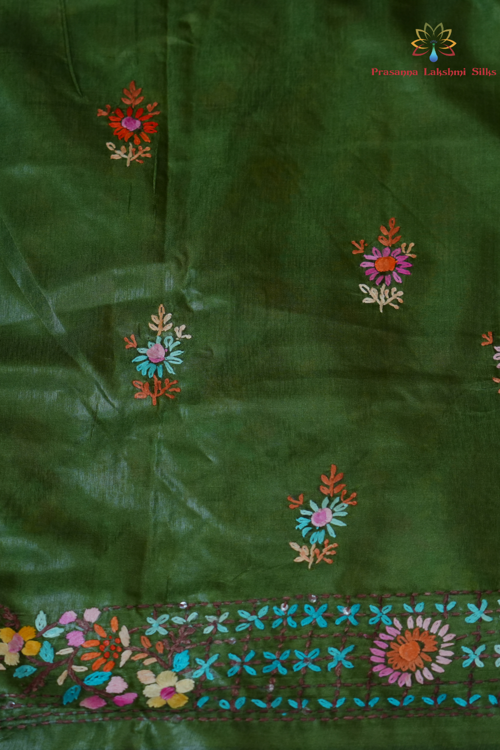 Elegant Tussar saree featuring thread woven Parsi work borders and running blouse piece.
