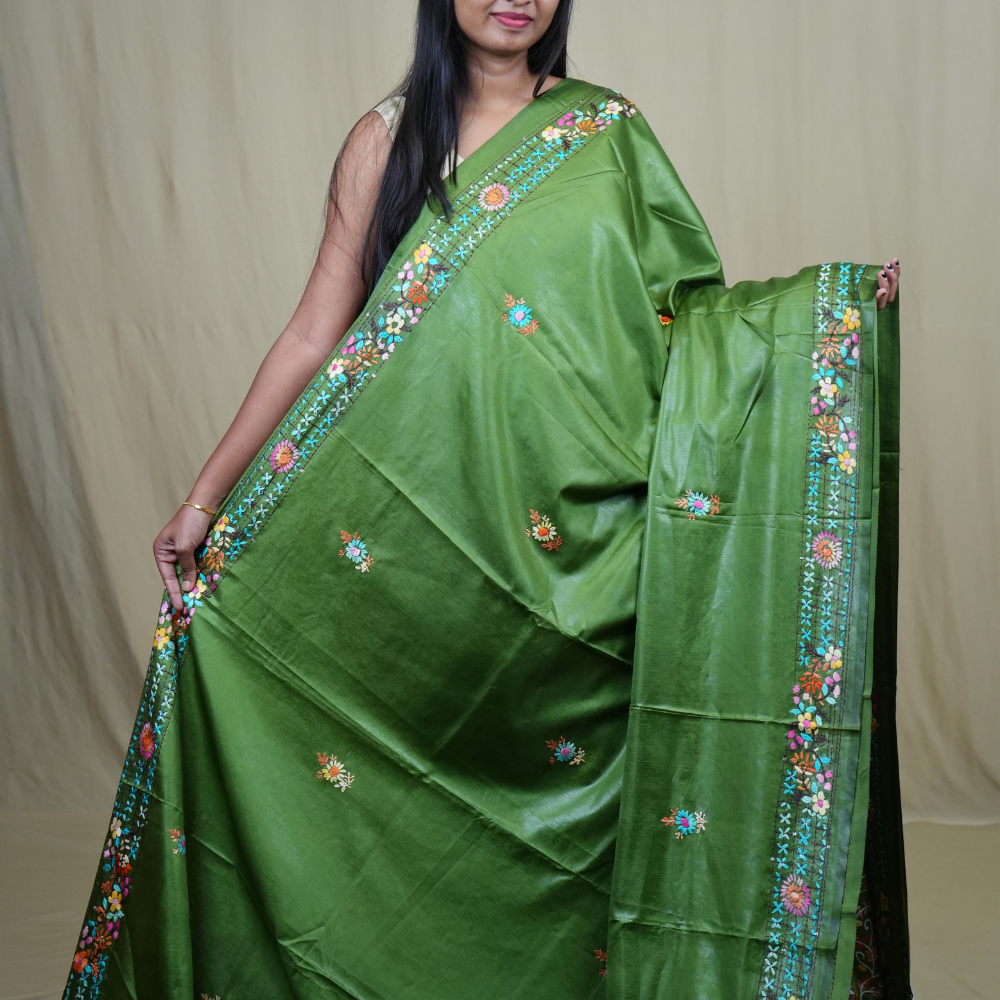 Traditional semi Tussar saree suitable for festive occasions with intricate Parsi work detailing.
