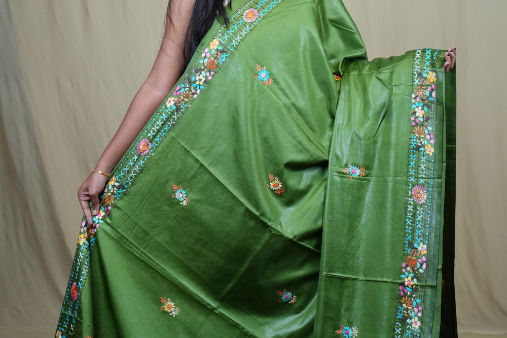 Traditional semi Tussar saree suitable for festive occasions with intricate Parsi work detailing.