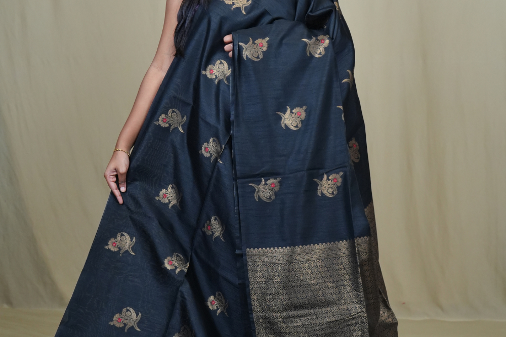 Semi Dupion Silk Saree with all-over zari woven motifs, rich brocade pallu, and elegant zari borders.
