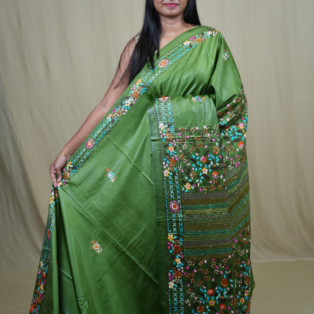 Semi Tussar saree with all-over thread woven motifs and rich Parsi work pallu.
