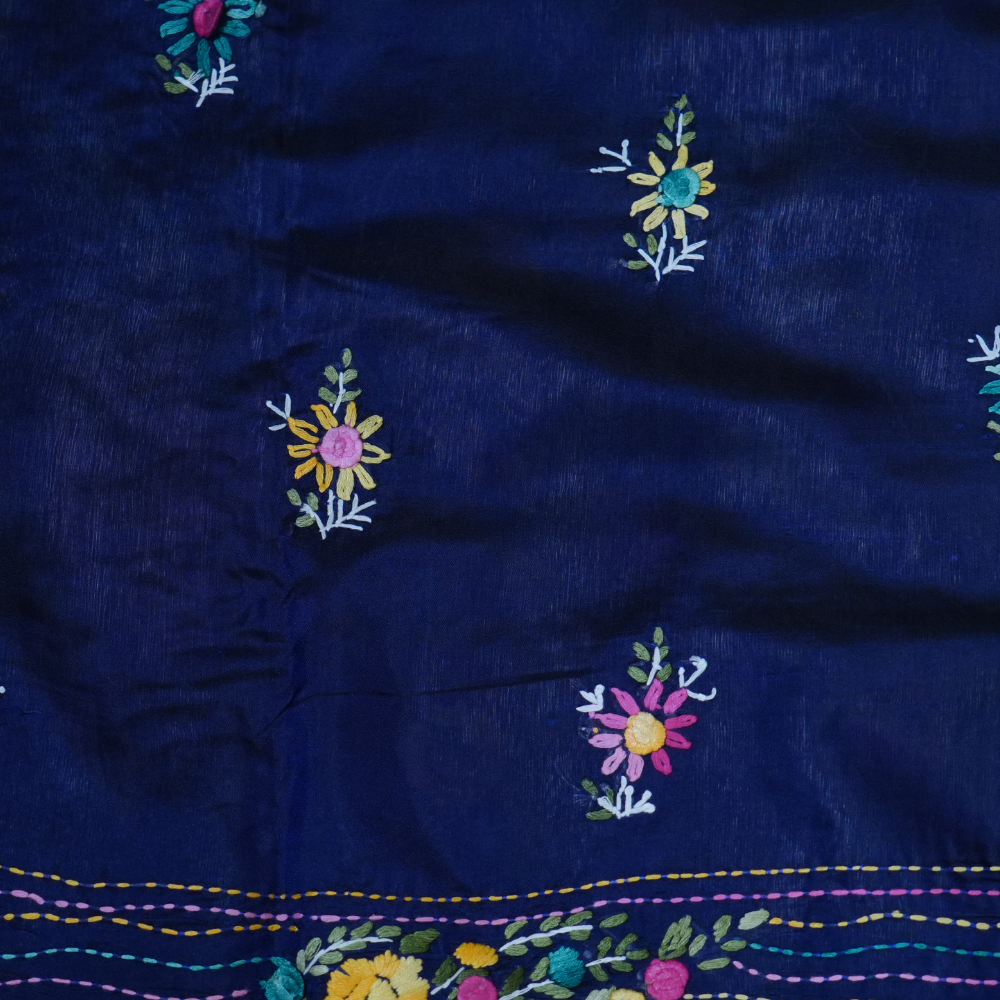 Elegant Tussar saree featuring thread woven Parsi work borders and running blouse piece.
