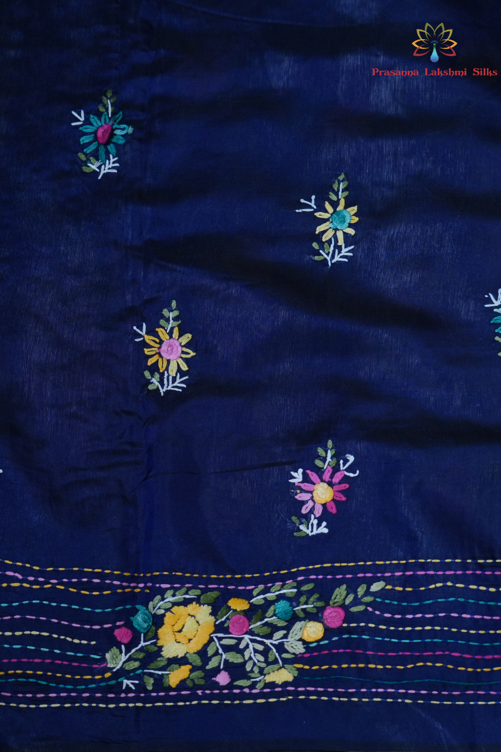 Elegant Tussar saree featuring thread woven Parsi work borders and running blouse piece.
