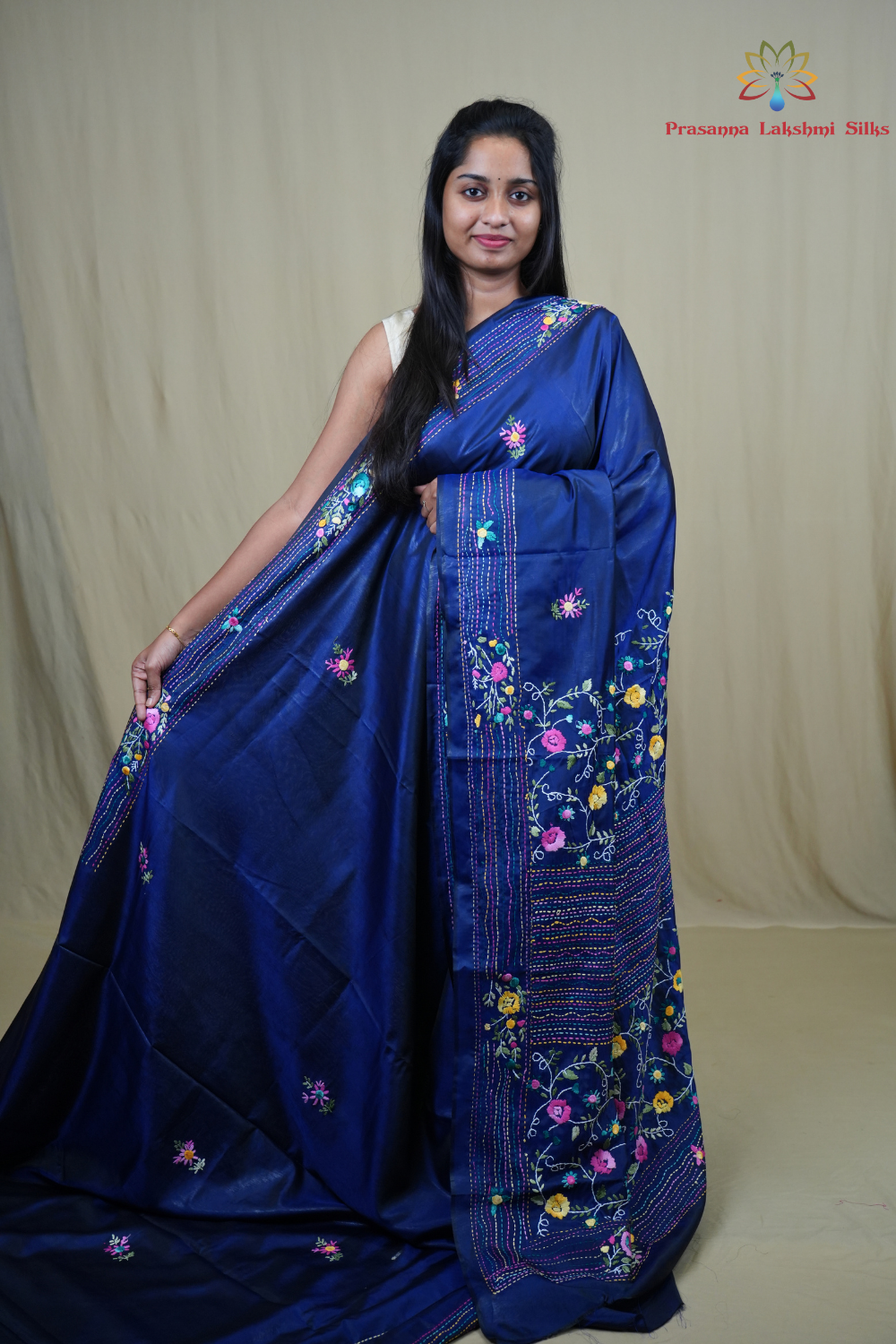 Semi Tussar saree with all-over thread woven motifs and rich Parsi work pallu.
