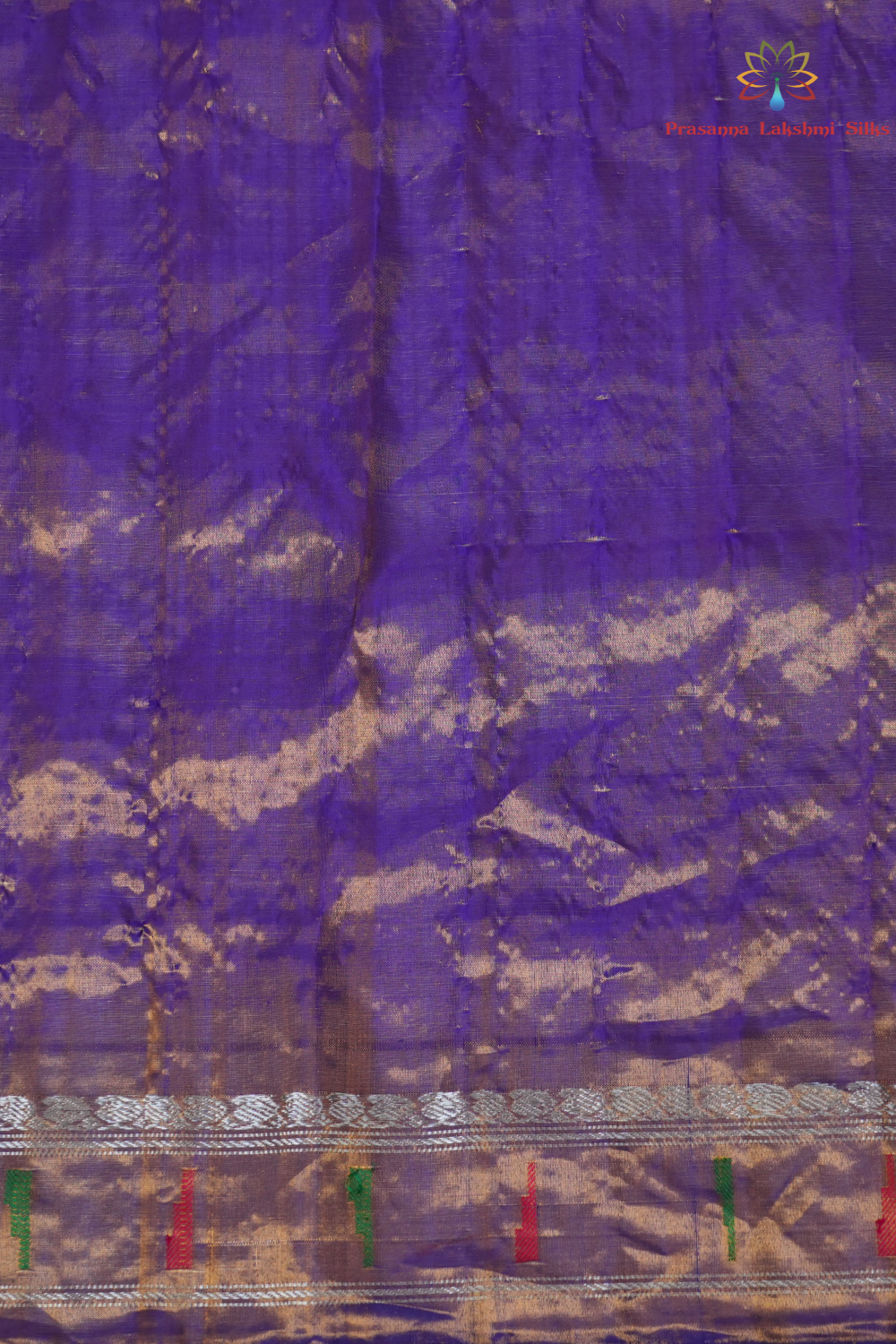 Elegant Gadwal tissue silk saree featuring brocade tissue pallu and contrast blouse.

