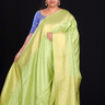 pista green Lightweight georgette saree with contrast pallu