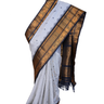 Traditional Gadwal SiCo saree featuring exquisite zari woven borders and blouse piece.
