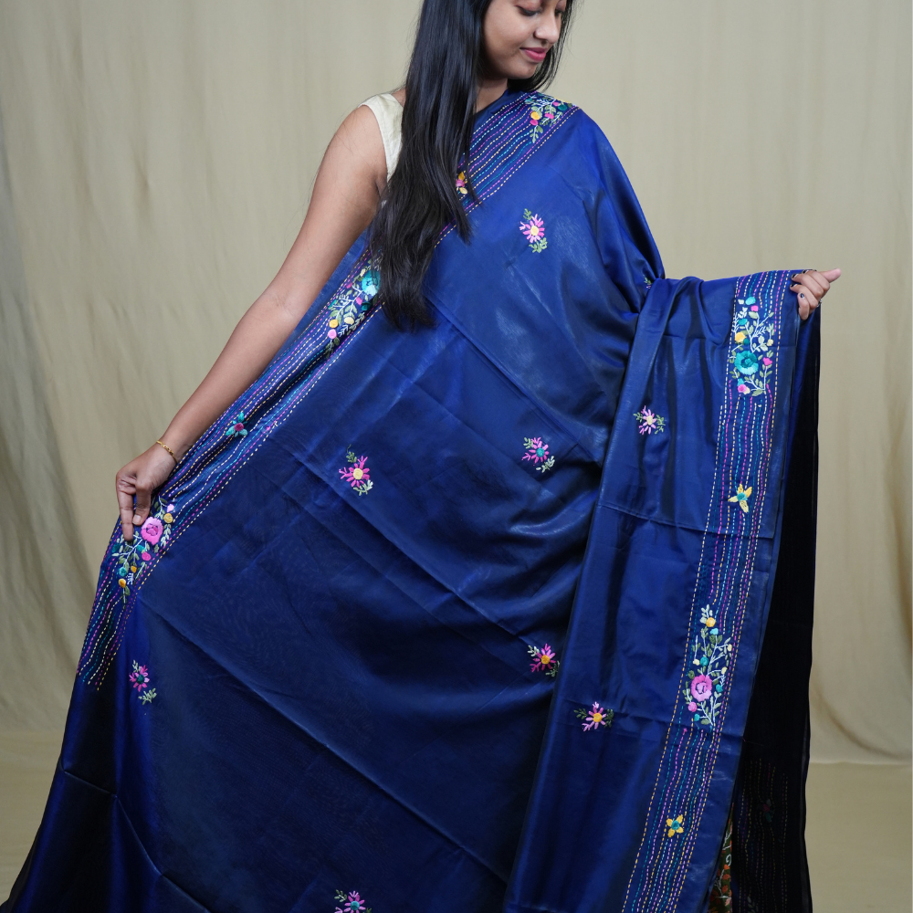 Traditional semi Tussar saree suitable for festive occasions with intricate Parsi work detailing.