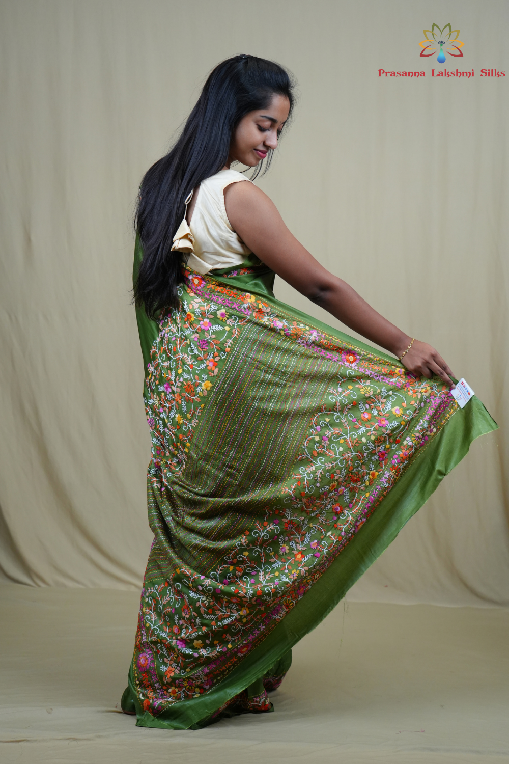 Semi Tussar saree with all-over thread woven motifs and rich Parsi work pallu.
