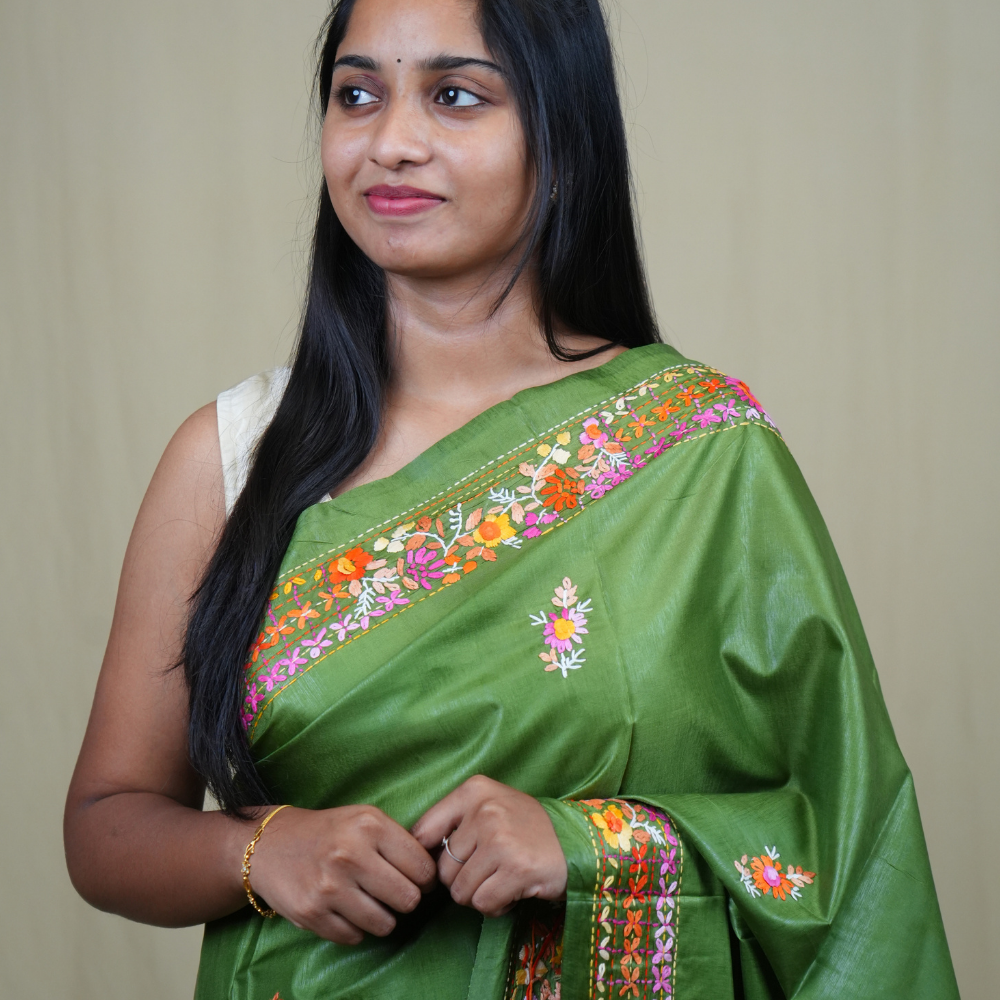 Traditional semi Tussar saree suitable for festive occasions with intricate Parsi work detailing.