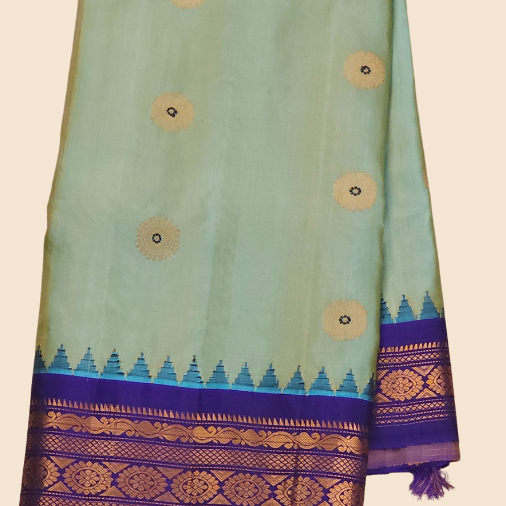 Gadwal pure silk saree paired with contrast blouse
