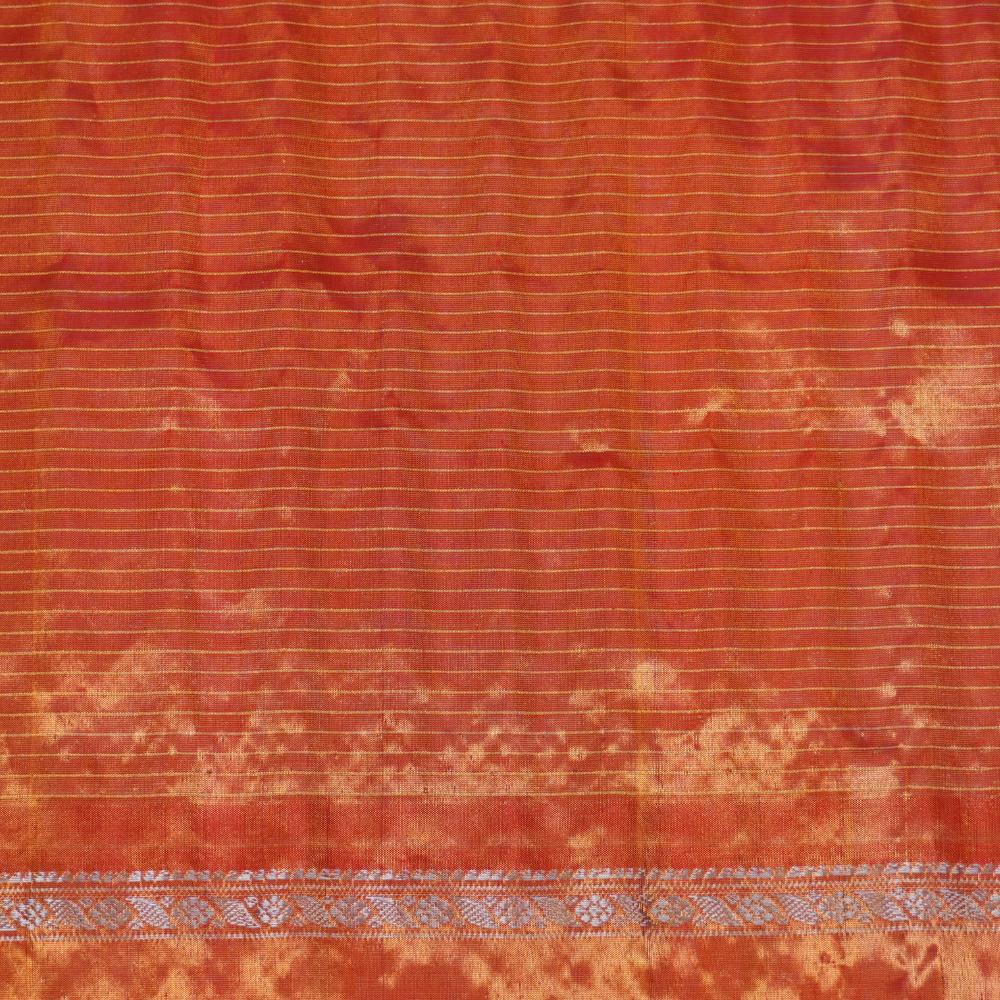 Elegant Gadwal tissue silk saree featuring brocade tissue pallu and contrast blouse.
