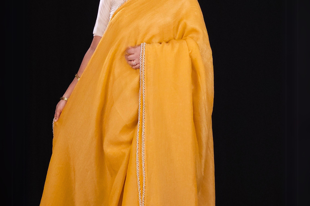 yellowish orange crush tissue saree for parties and small ocassions 