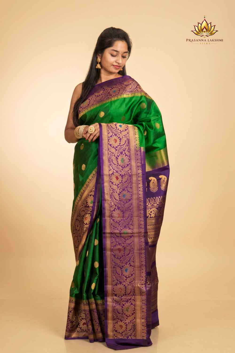 Premium Gadwal Silk Saree with woven zari motifs, luxurious brocade pallu, meenakari turning border, and matching contrast blouse.
