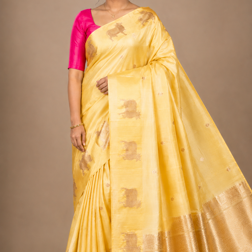 Pure Banarasi Raw Mango Silk saree with allover zari motifs and cow motif border
