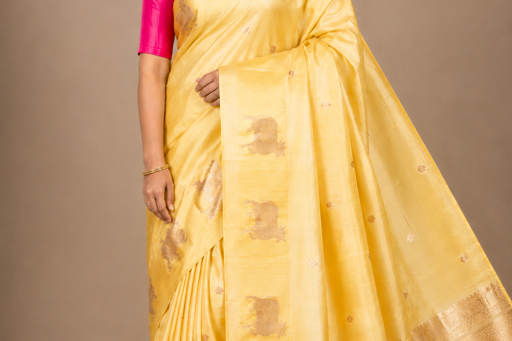 Pure Banarasi Raw Mango Silk saree with allover zari motifs and cow motif border
