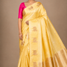 Pure Banarasi Raw Mango Silk saree with allover zari motifs and cow motif border
