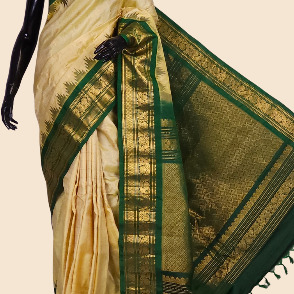 Handloom Gadwal pure silk saree with classic checks pattern and rich zari brocade pallu.
