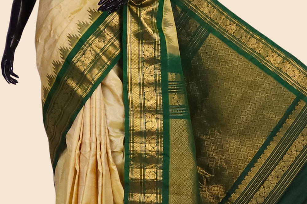 Handloom Gadwal pure silk saree with classic checks pattern and rich zari brocade pallu.
