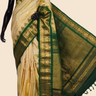 Handloom Gadwal pure silk saree with classic checks pattern and rich zari brocade pallu.
