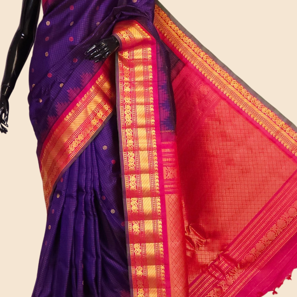 Handloom Gadwal pure silk saree with classic checks pattern and rich zari brocade pallu.
