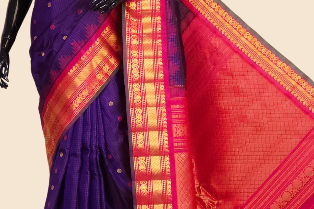 Handloom Gadwal pure silk saree with classic checks pattern and rich zari brocade pallu.
