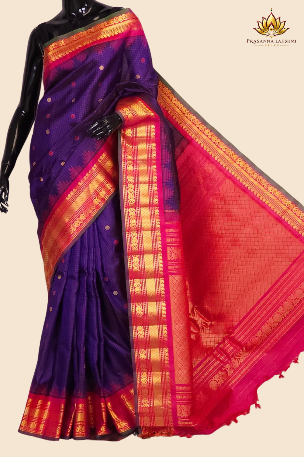 Handloom Gadwal pure silk saree with classic checks pattern and rich zari brocade pallu.

