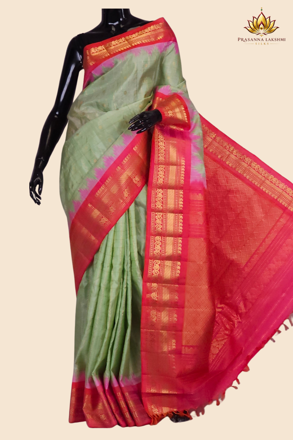 Handloom Gadwal pure silk saree with classic checks pattern and rich zari brocade pallu.
