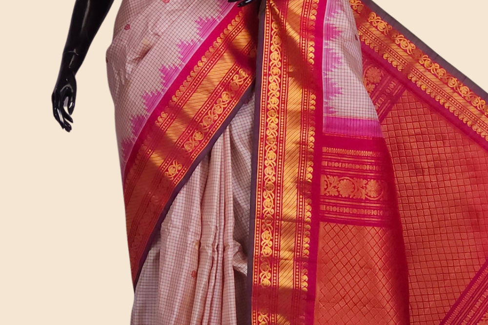 Handloom Gadwal pure silk saree with classic checks pattern and rich zari brocade pallu.
