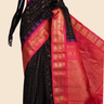 Handloom Gadwal pure silk saree with classic checks pattern and rich zari brocade pallu.
