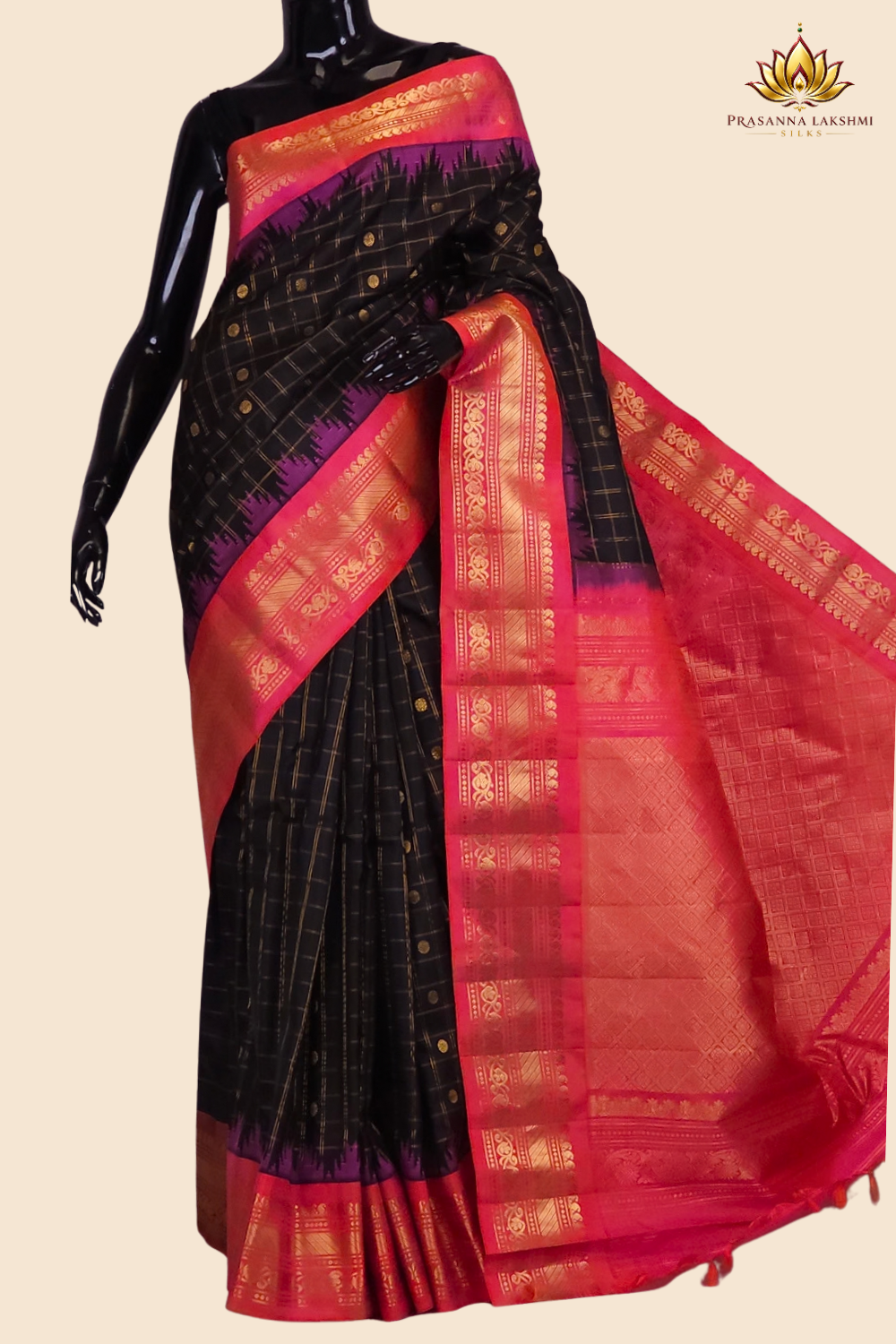 Handloom Gadwal pure silk saree with classic checks pattern and rich zari brocade pallu.
