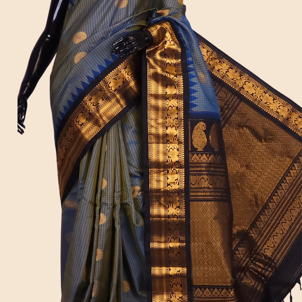 Handloom Gadwal pure silk saree with classic checks pattern and rich zari brocade pallu.
