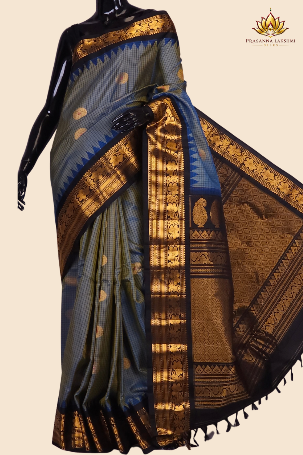 Handloom Gadwal pure silk saree with classic checks pattern and rich zari brocade pallu.
