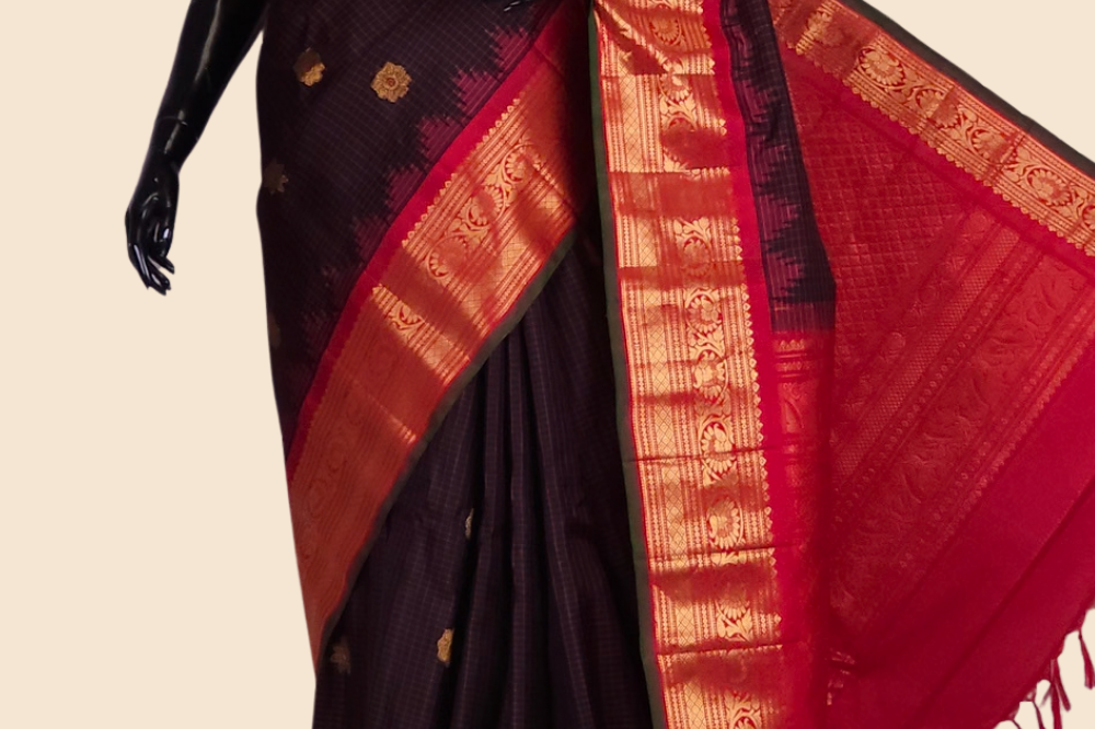 Handloom Gadwal pure silk saree with classic checks pattern and rich zari brocade pallu.
