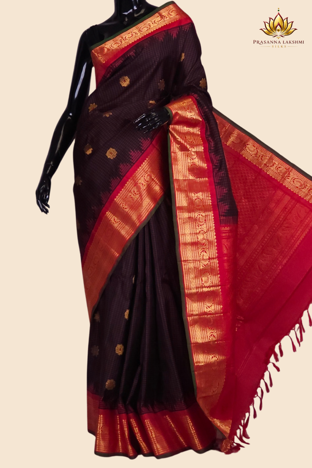Handloom Gadwal pure silk saree with classic checks pattern and rich zari brocade pallu.
