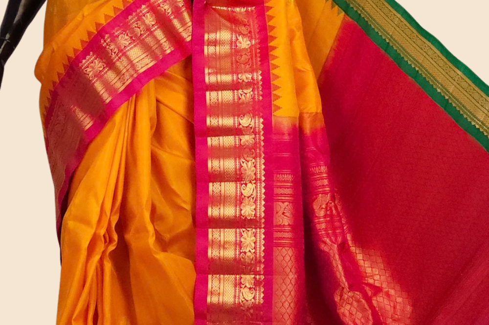 Handloom Gadwal pure silk saree with zari woven motifs
