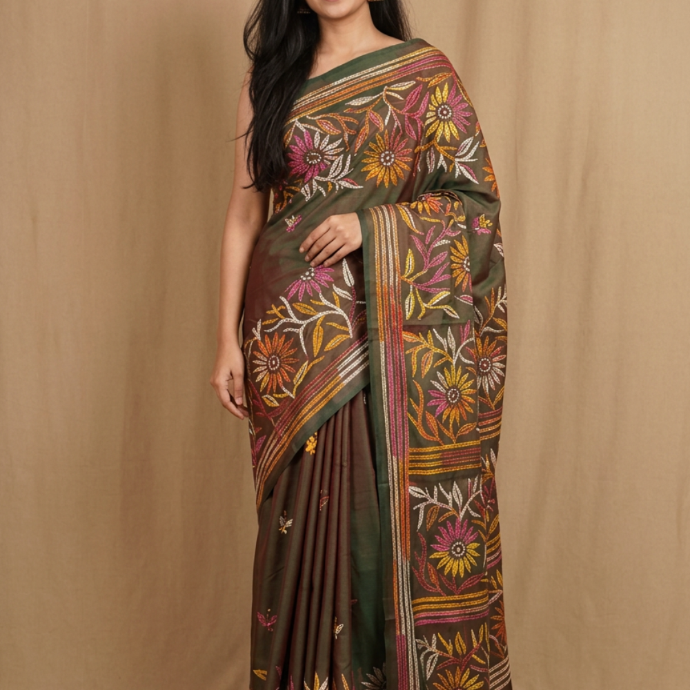 Semi Bangalore silk saree with all-over hand Kantha work and rich embroidered pallu.