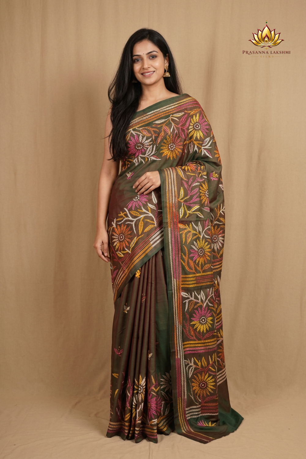 Semi Bangalore silk saree with all-over hand Kantha work and rich embroidered pallu.